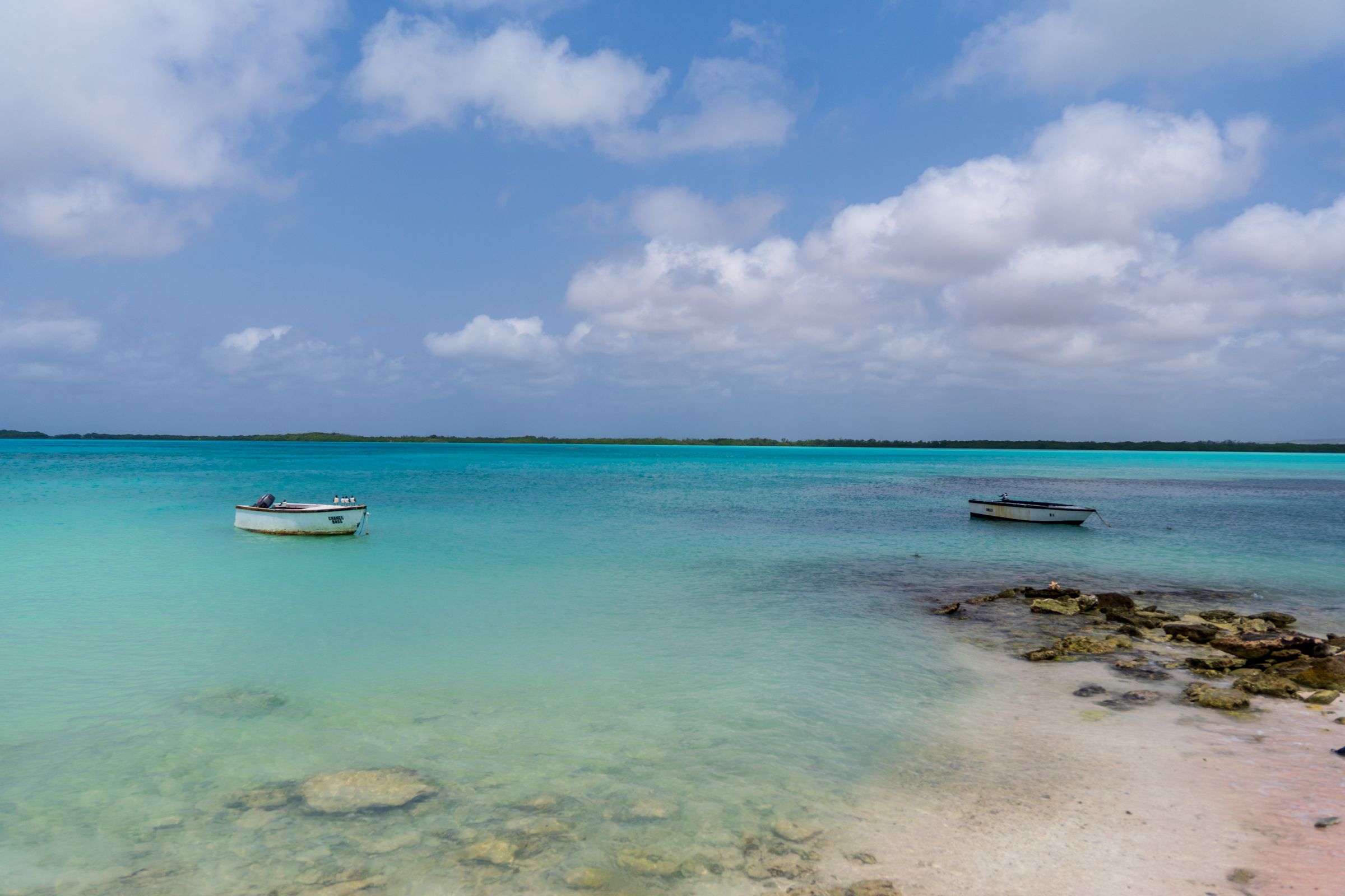 Boats on the clear water of Boneiru